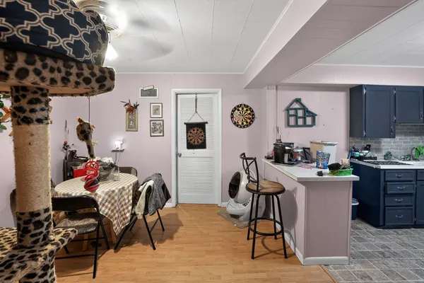 a view of a workspace and kitchen