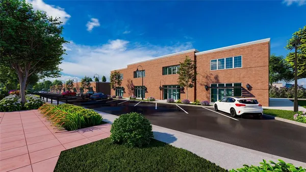a view of a street with cars