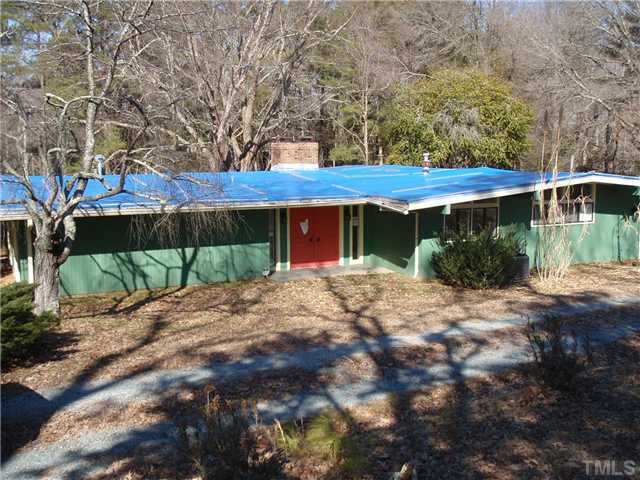 117 Bowden Road Chapel Hill, NC 27516 - Photo 12 of 12 a front view of a house with a yard