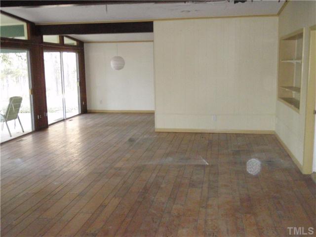 117 Bowden Road Chapel Hill, NC 27516 - Photo 3 of 12 a view of an empty room and window