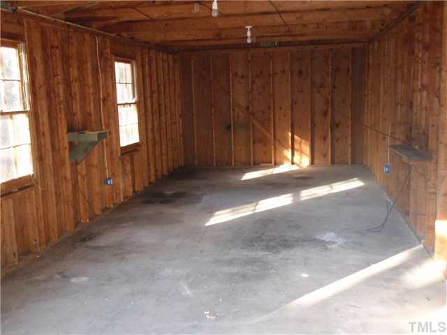 117 Bowden Road Chapel Hill, NC 27516 - Photo 9 of 12 a view of a closet with wooden walls