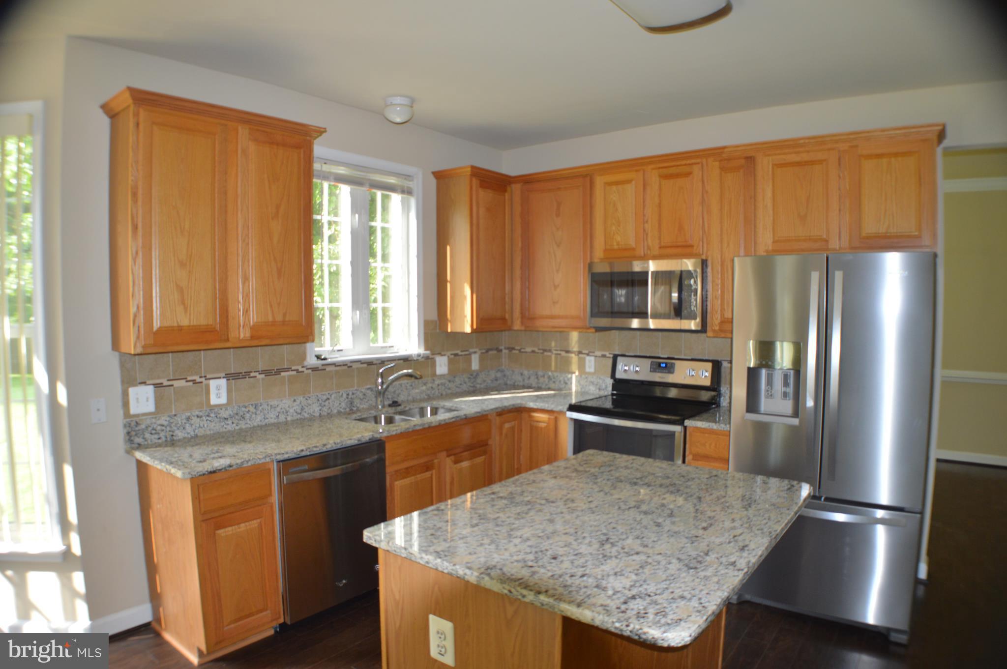 8408 Lark Brown Road Columbia, MD 21045 - Photo 12 of 30 Kitchen with great lip on island