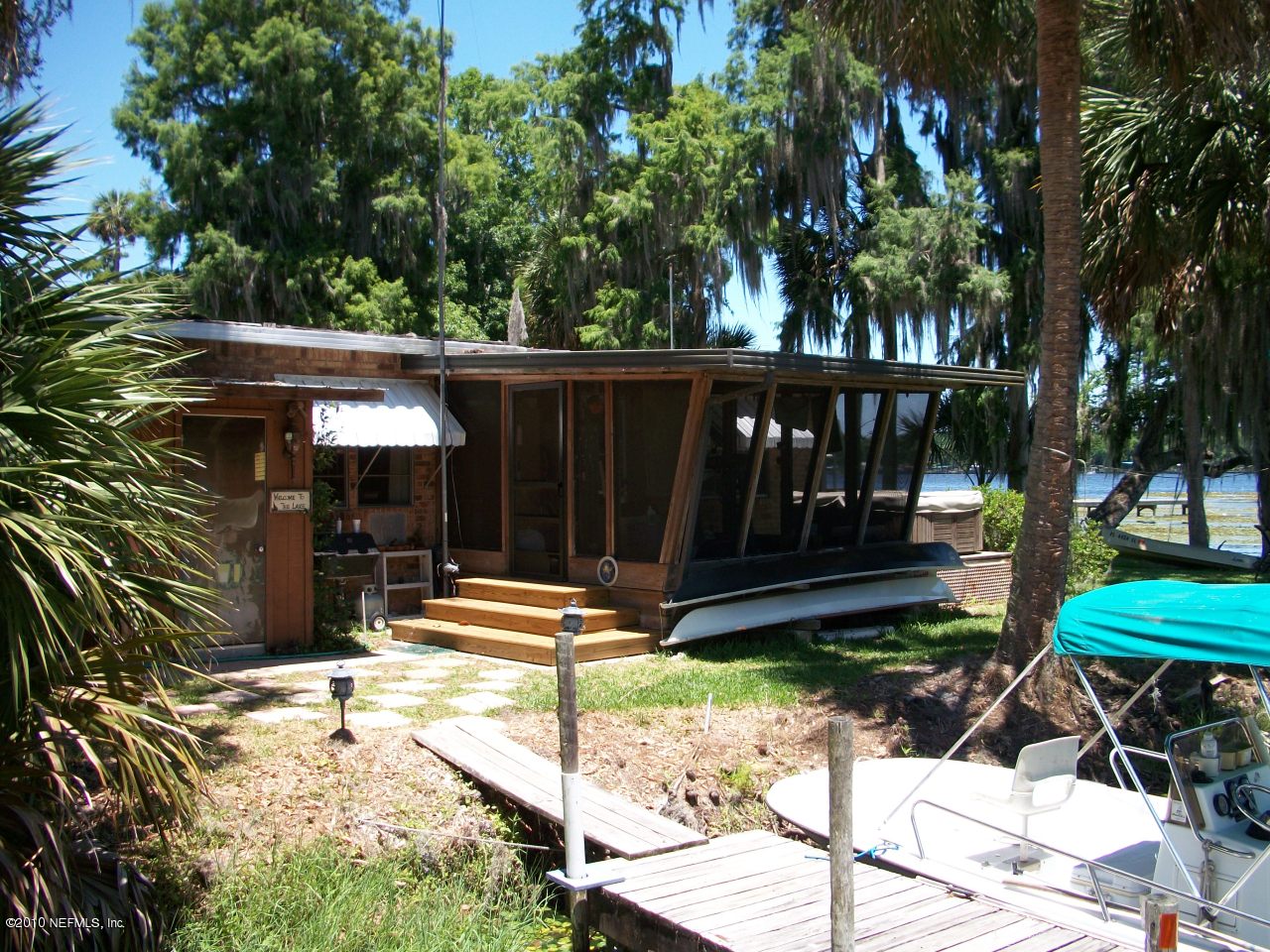 108 Minwill Circle Georgetown, FL 32139 - Photo 6 of 8 Screened Porch adn Docking Area