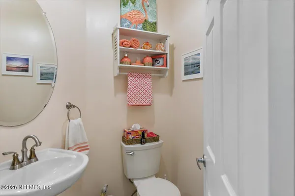 a kitchen with cabinets and window