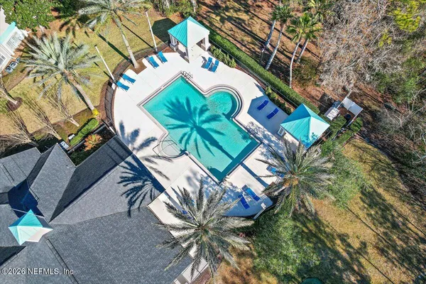 a picture of a wall with a white wall and a white refrigerator