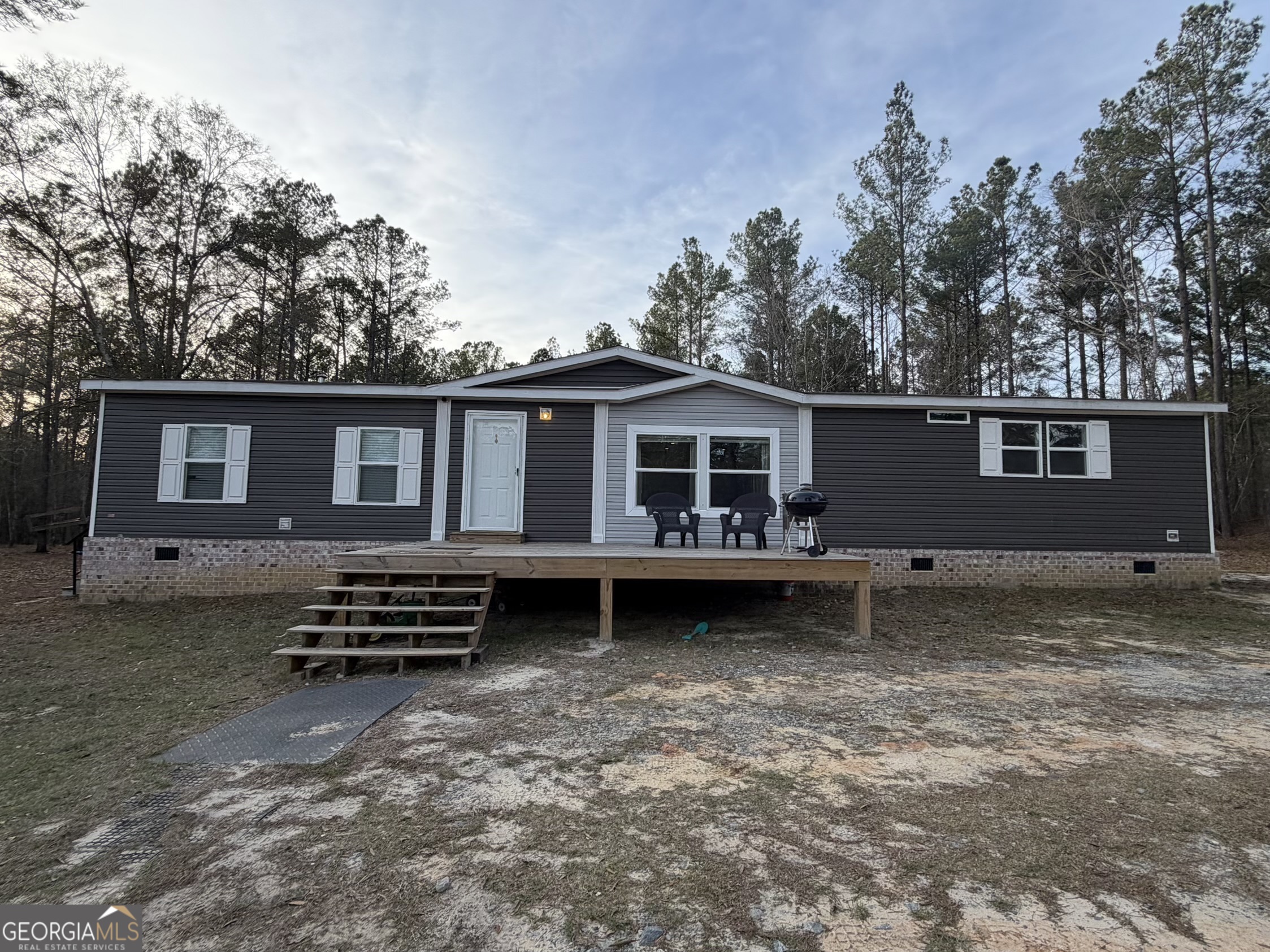 2601 New Evergreen Church Road Cadwell, GA 31009 - Photo 1 of 30 a house view with a backyard space