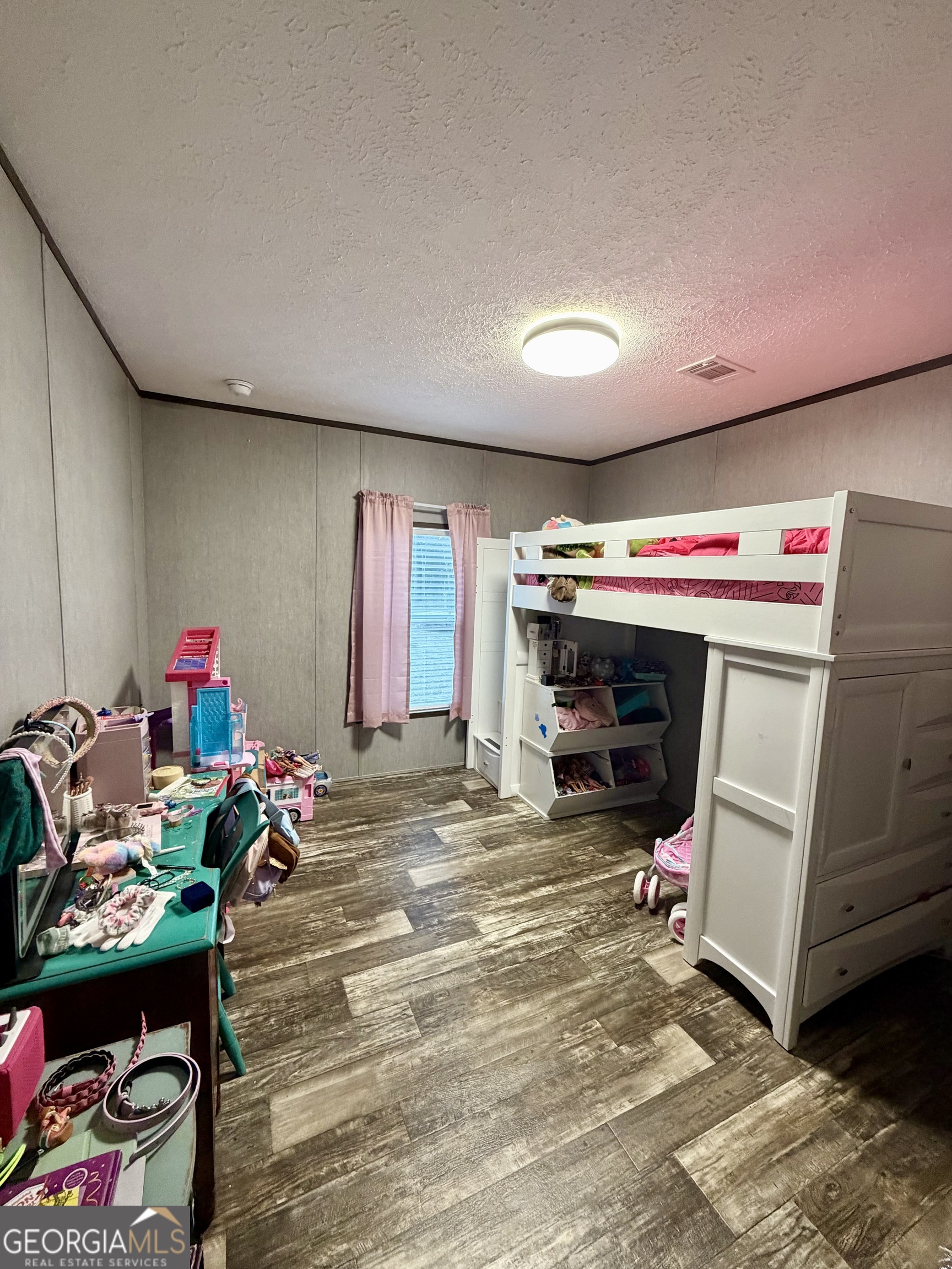 2601 New Evergreen Church Road Cadwell, GA 31009 - Photo 17 of 30 a room with furniture a washer and dryer