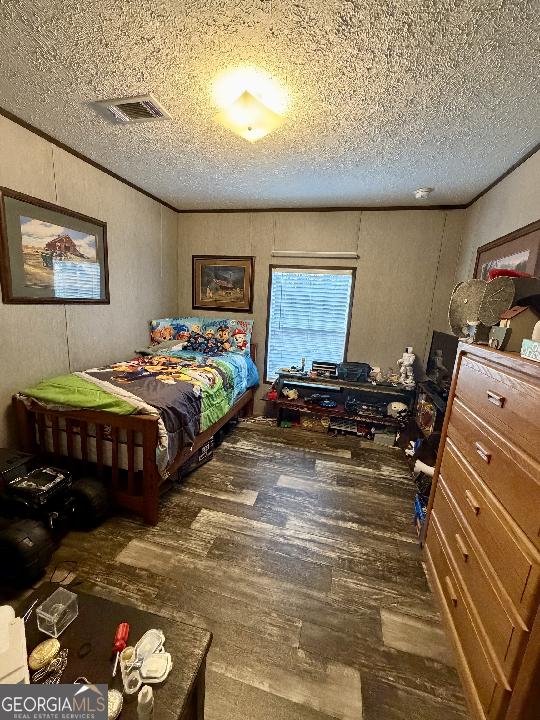 2601 New Evergreen Church Road Cadwell, GA 31009 - Photo 18 of 30 a bedroom with two beds and a flat screen tv