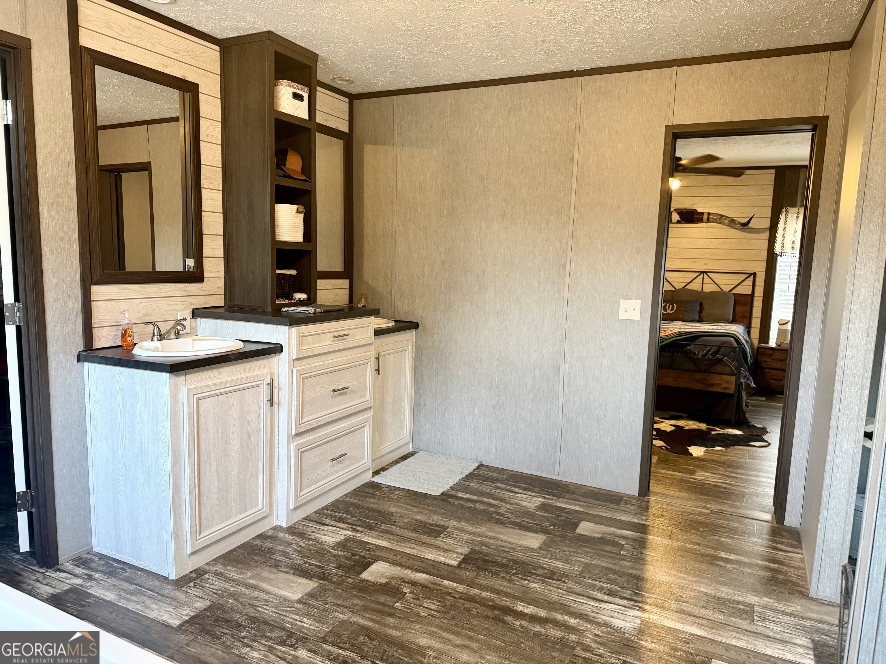 2601 New Evergreen Church Road Cadwell, GA 31009 - Photo 26 of 30 a bathroom with a sink and a mirror