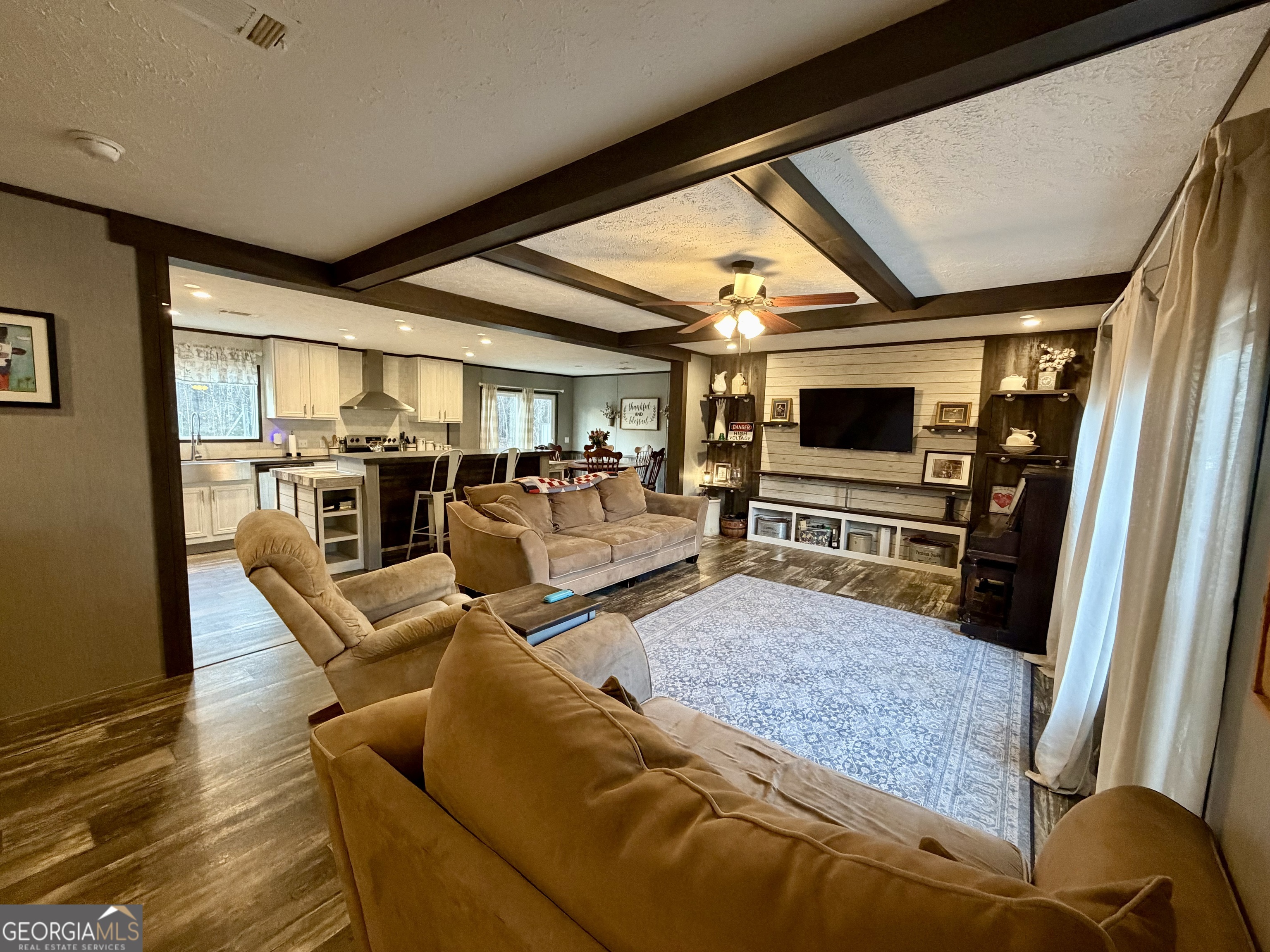 2601 New Evergreen Church Road Cadwell, GA 31009 - Photo 5 of 30 a living room with furniture and a flat screen tv