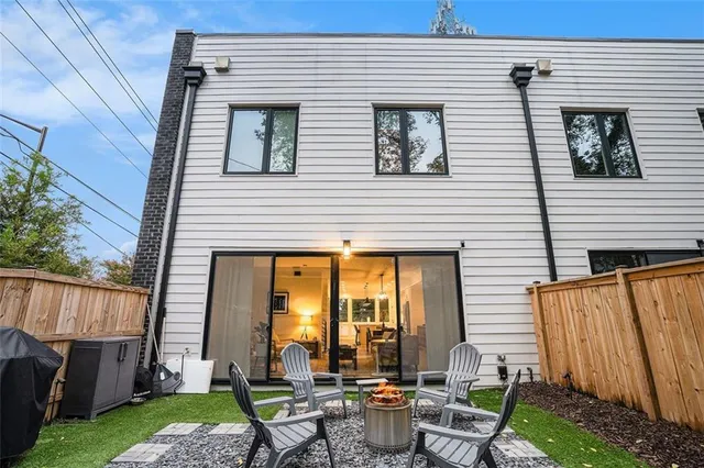 a view of a patio with chairs and table in a patio