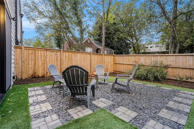 a view of a bench in a backyard