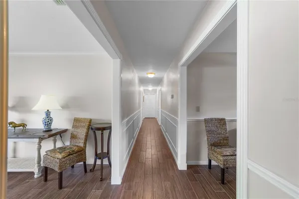 a view of livingroom with furniture and wooden floor