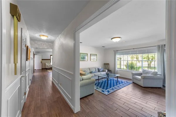 a living room with furniture and a window