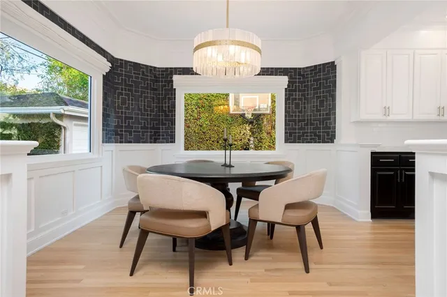 a view of a dining room with furniture window and outside view