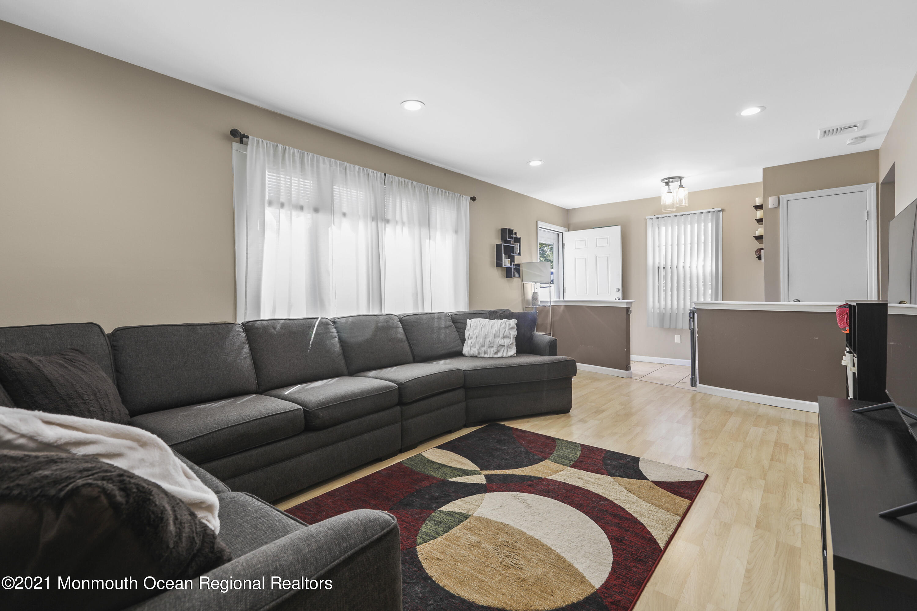 162 County Road Cliffwood, NJ 07721 - Photo 5 of 17 a living room with furniture and a large window