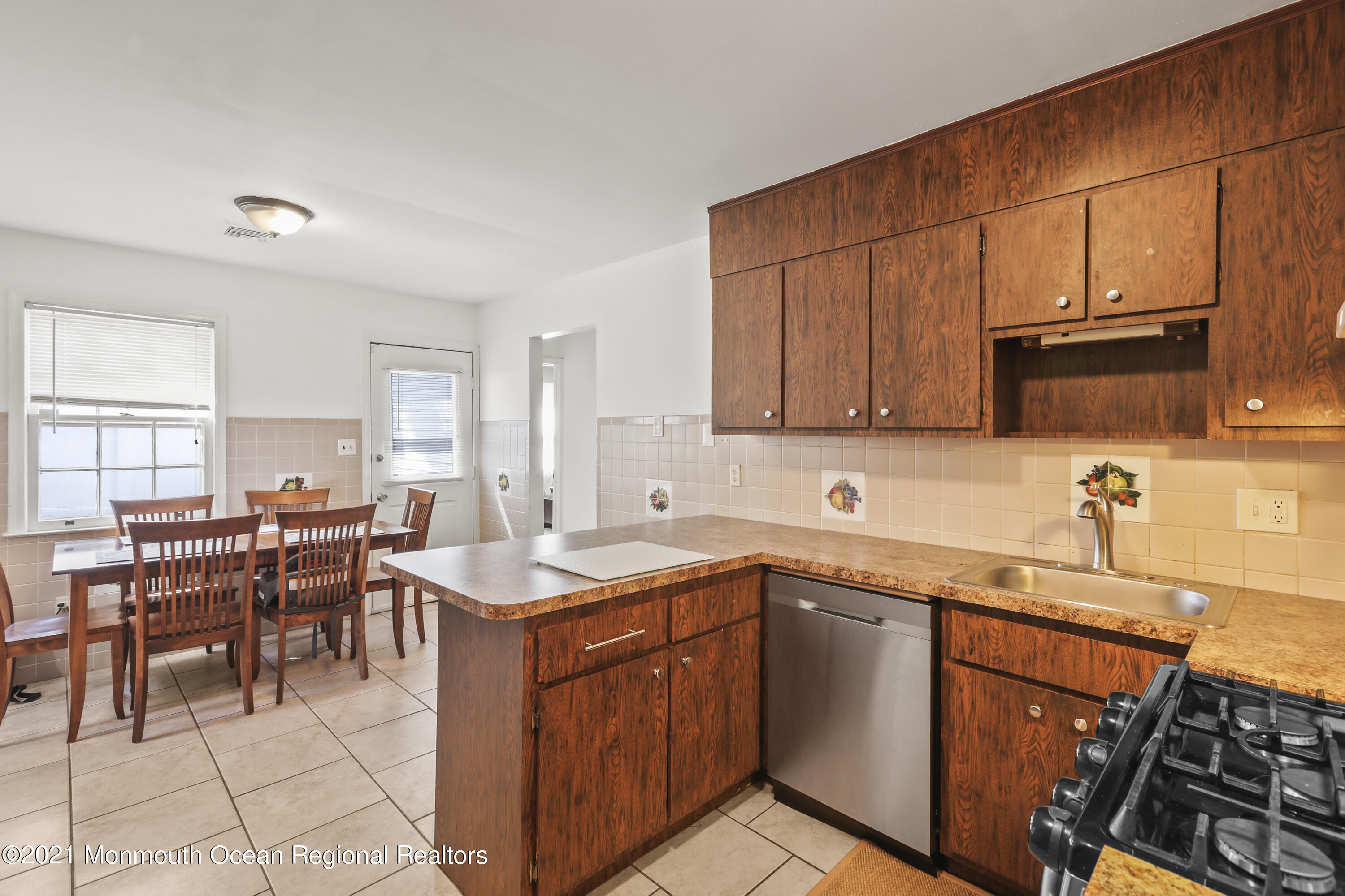 162 County Road Cliffwood, NJ 07721 - Photo 8 of 17 a kitchen that has a sink a stove counter space and cabinets