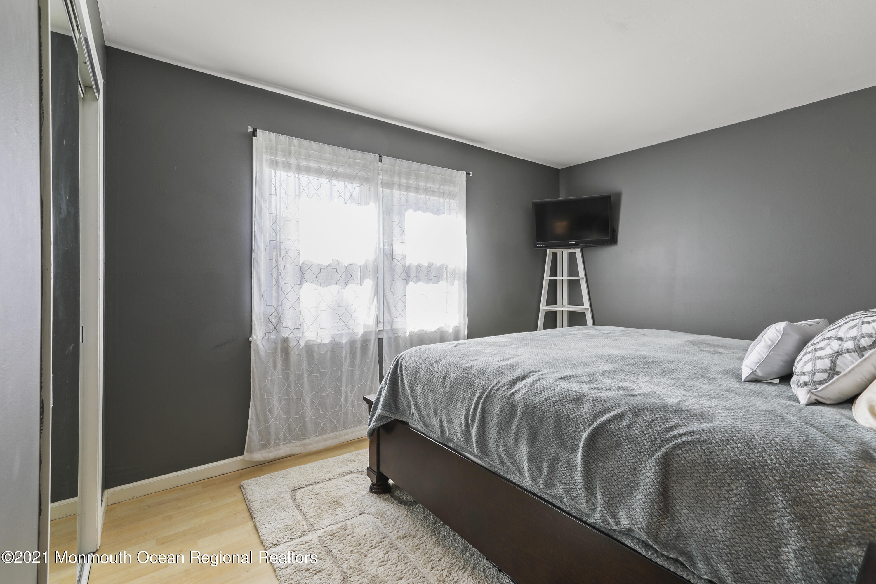 162 County Road Cliffwood, NJ 07721 - Photo 10 of 17 a bedroom with a bed and a window