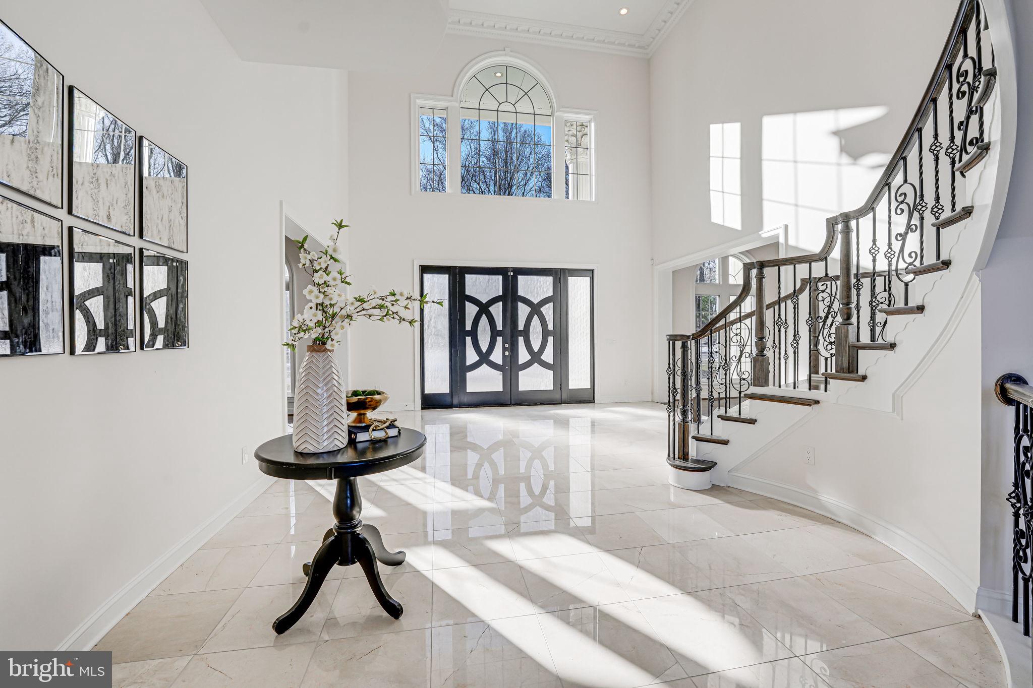 10305 Beach Mill Road Great Falls, VA 22066 - Photo 2 of 74 a view of entryway and hall with wooden floor