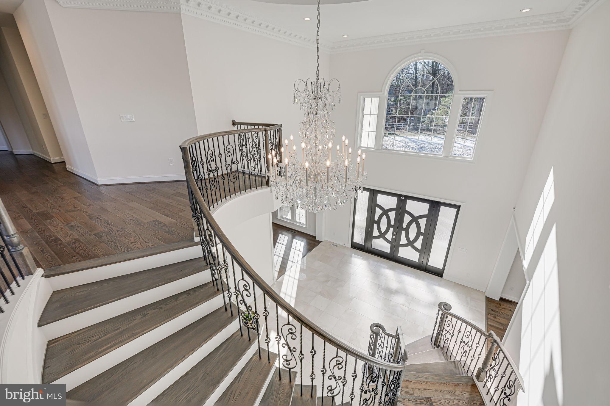 10305 Beach Mill Road Great Falls, VA 22066 - Photo 38 of 74 a view of entryway and hall with wooden floor