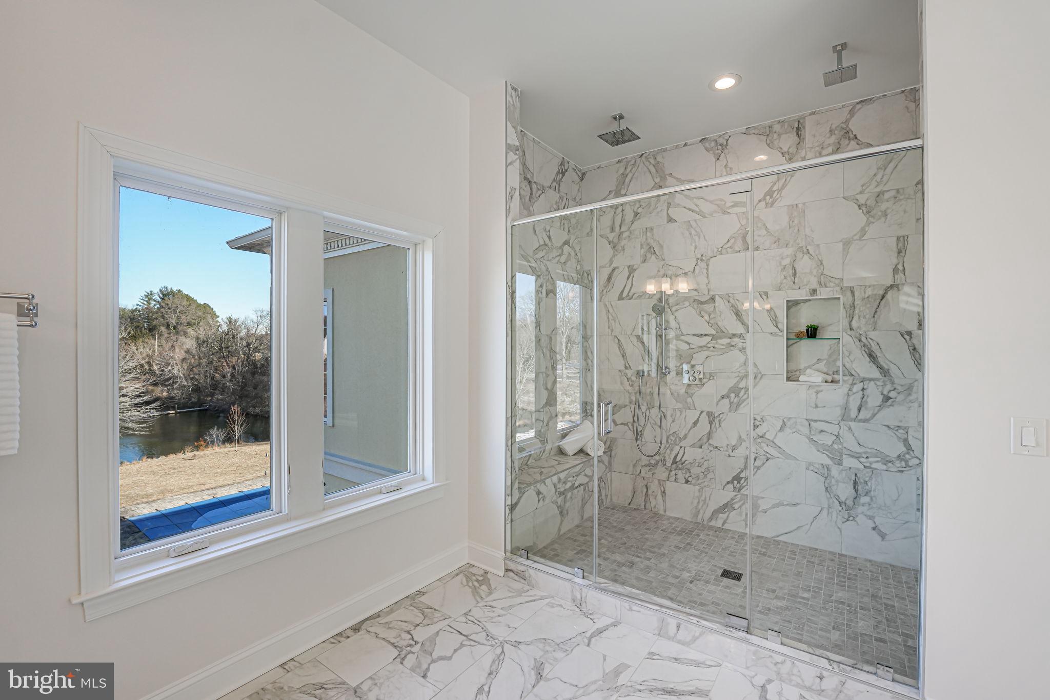 10305 Beach Mill Road Great Falls, VA 22066 - Photo 54 of 74 a bathroom with a shower