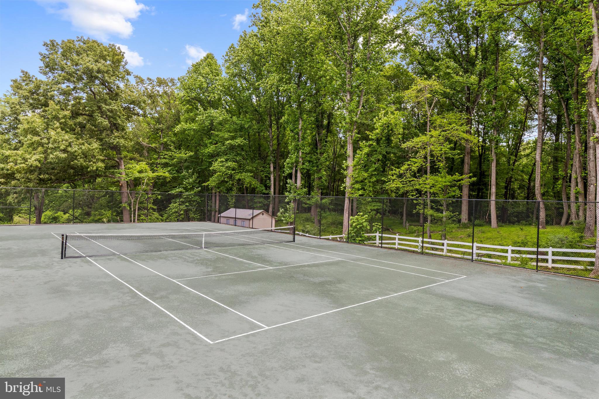 10305 Beach Mill Road Great Falls, VA 22066 - Photo 68 of 74 a view of a tennis court