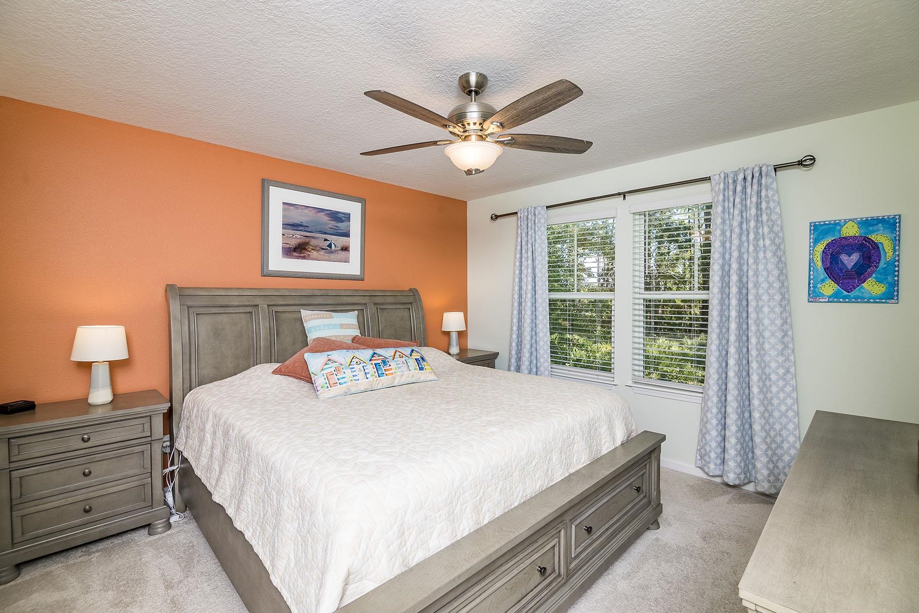 74 Ridge Lake Road St. Augustine, FL 32086 - Photo 24 of 47 a bedroom with a bed and a window
