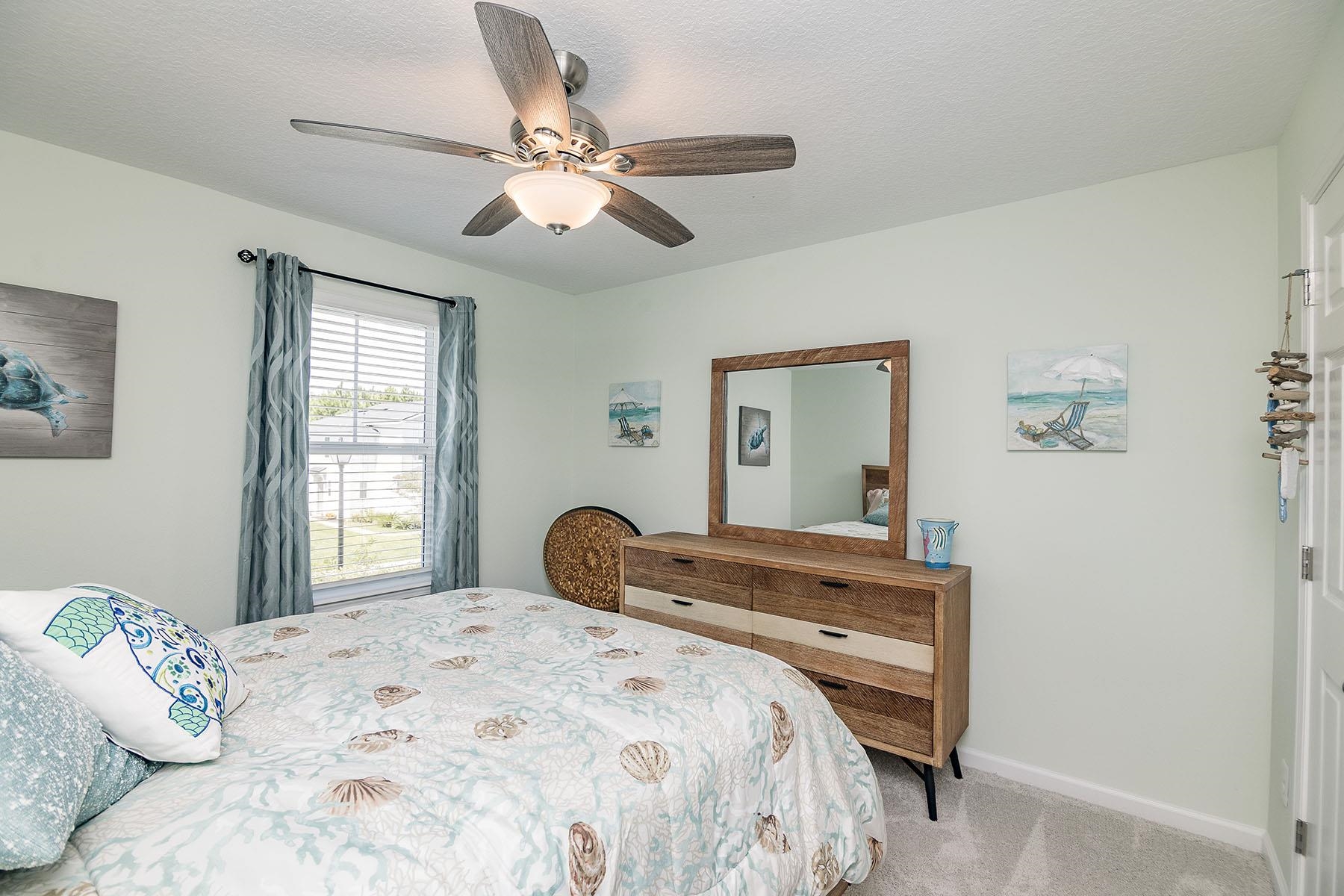 74 Ridge Lake Road St. Augustine, FL 32086 - Photo 35 of 47 Bedroom featuring light colored carpet, a ceiling fan, and a textured ceiling