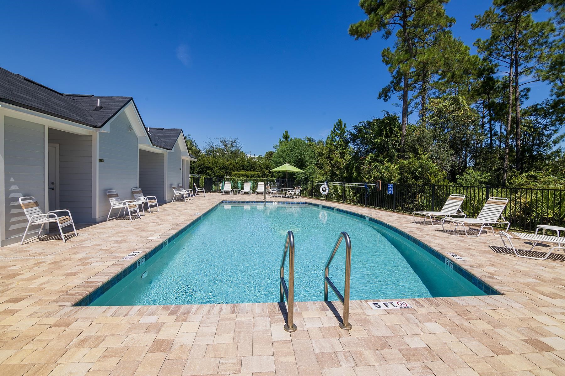 74 Ridge Lake Road St. Augustine, FL 32086 - Photo 39 of 47 a view of swimming pool with outdoor seating