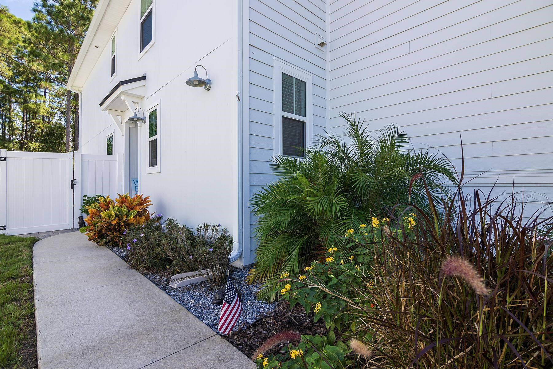 74 Ridge Lake Road St. Augustine, FL 32086 - Photo 4 of 47 Path to front door entrance and gate to back patio