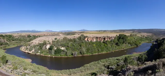 a view of a lake with a mountain in the background