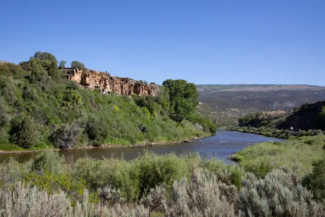 a view of a lake with a yard