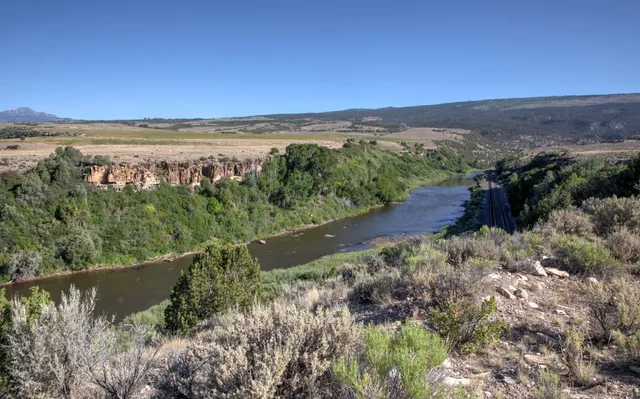 a view of a lake with a mountain in the background