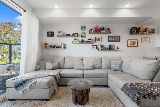 a living room with furniture and a couch