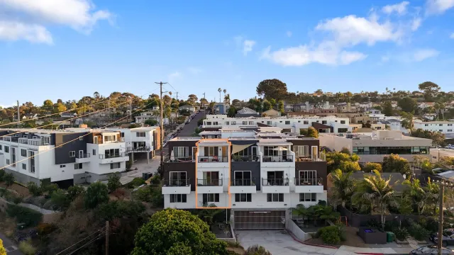 a view of a city with tall buildings