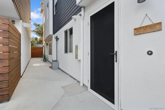 a view of a house with a white door
