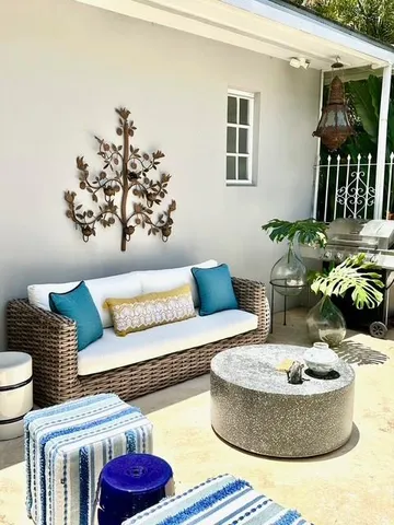 a front view of a house with patio