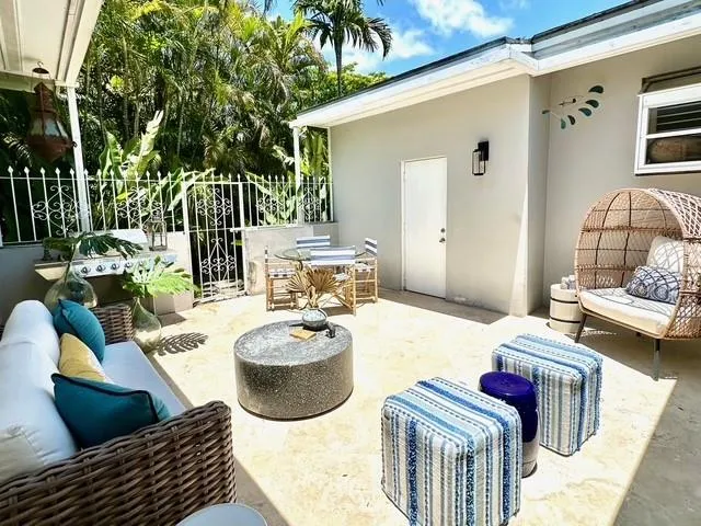a living room with furniture and decor