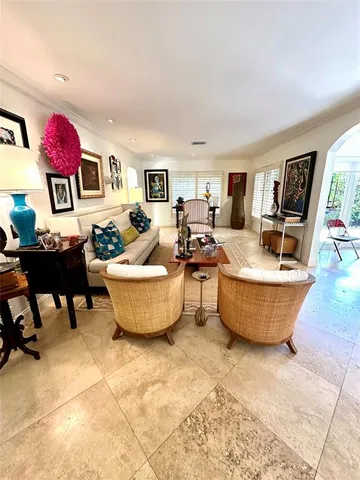 a living room with furniture and a couch