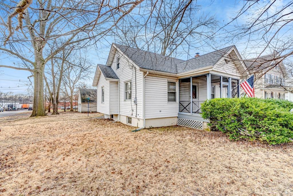402 Runyon Avenue Middlesex, NJ 08846 - Photo 3 of 22 a view of a house with a yard covered in snow