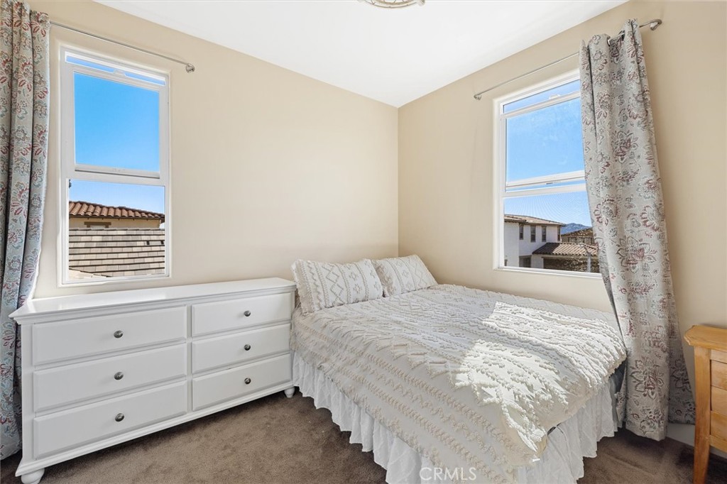 3898 Hayfield Loop San Luis Obispo, CA 93401 - Photo 15 of 19 a bedroom with a bed and a window