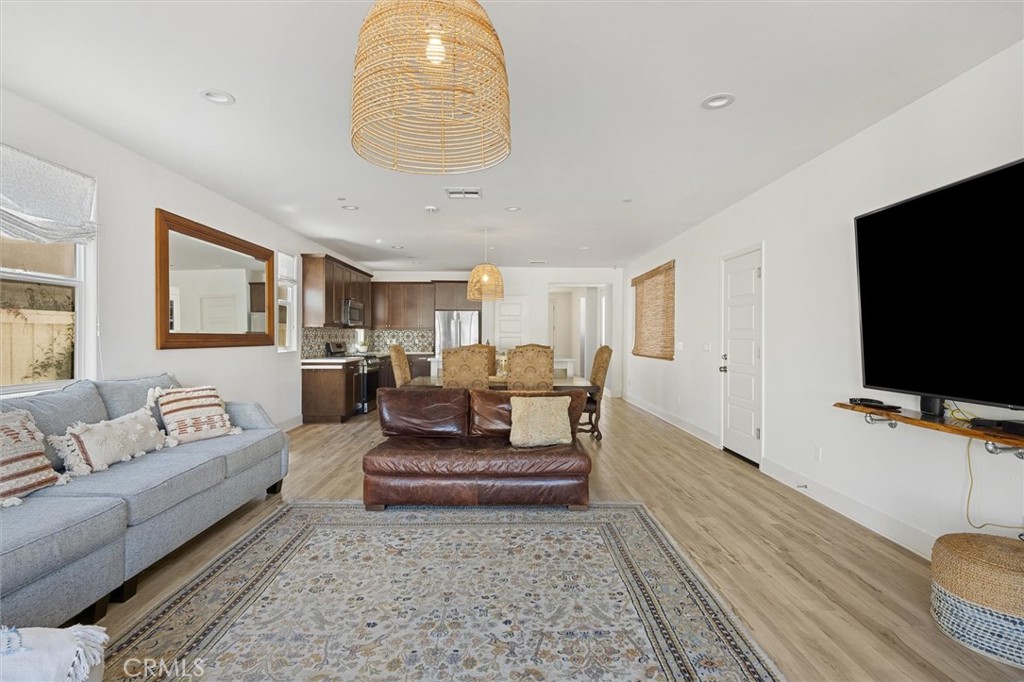 3898 Hayfield Loop San Luis Obispo, CA 93401 - Photo 6 of 19 a living room with furniture and a flat screen tv
