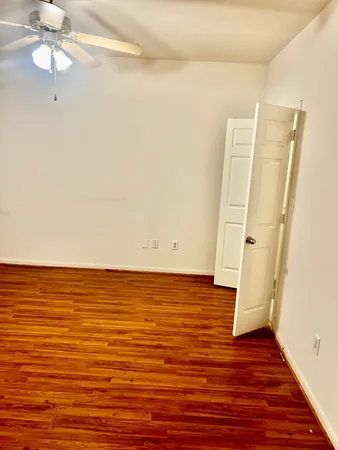 a kitchen with stainless steel appliances a refrigerator and a stove top oven