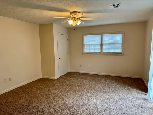 a view of an empty room with window