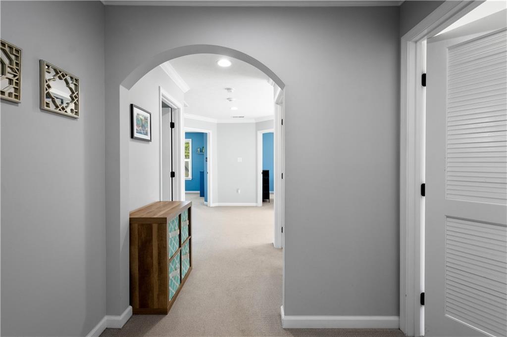 4528 Walnut Ridge Circle McDonald, PA 15057 - Photo 20 of 50 a view of a hallway with wooden shelves