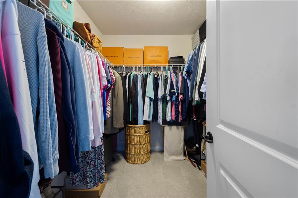 4528 Walnut Ridge Circle McDonald, PA 15057 - Photo 27 of 50 a view of walk in closet with clothes