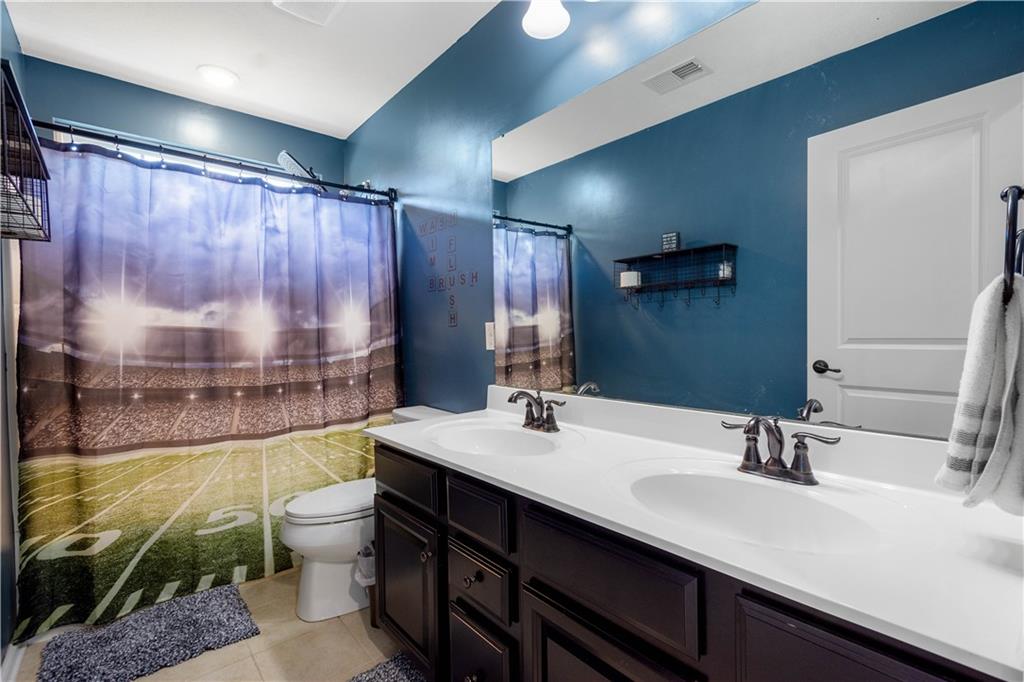 4528 Walnut Ridge Circle McDonald, PA 15057 - Photo 34 of 50 a bathroom with a double vanity sink mirror and toilet