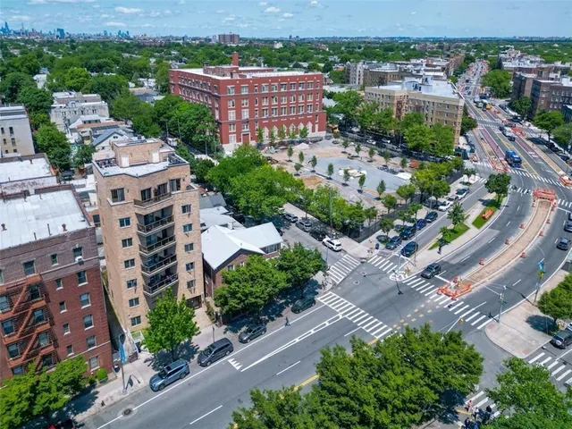 an aerial view of a city with lots of residential buildings