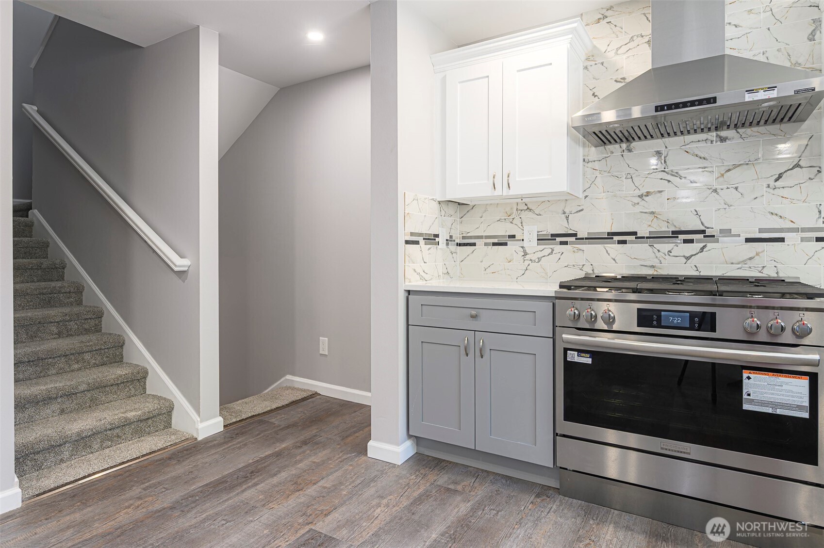 3 Burning Tree Drive, Unit 3 Yakima, WA 98902 - Photo 11 of 32 a kitchen with stainless steel appliances granite countertop a stove and a sink