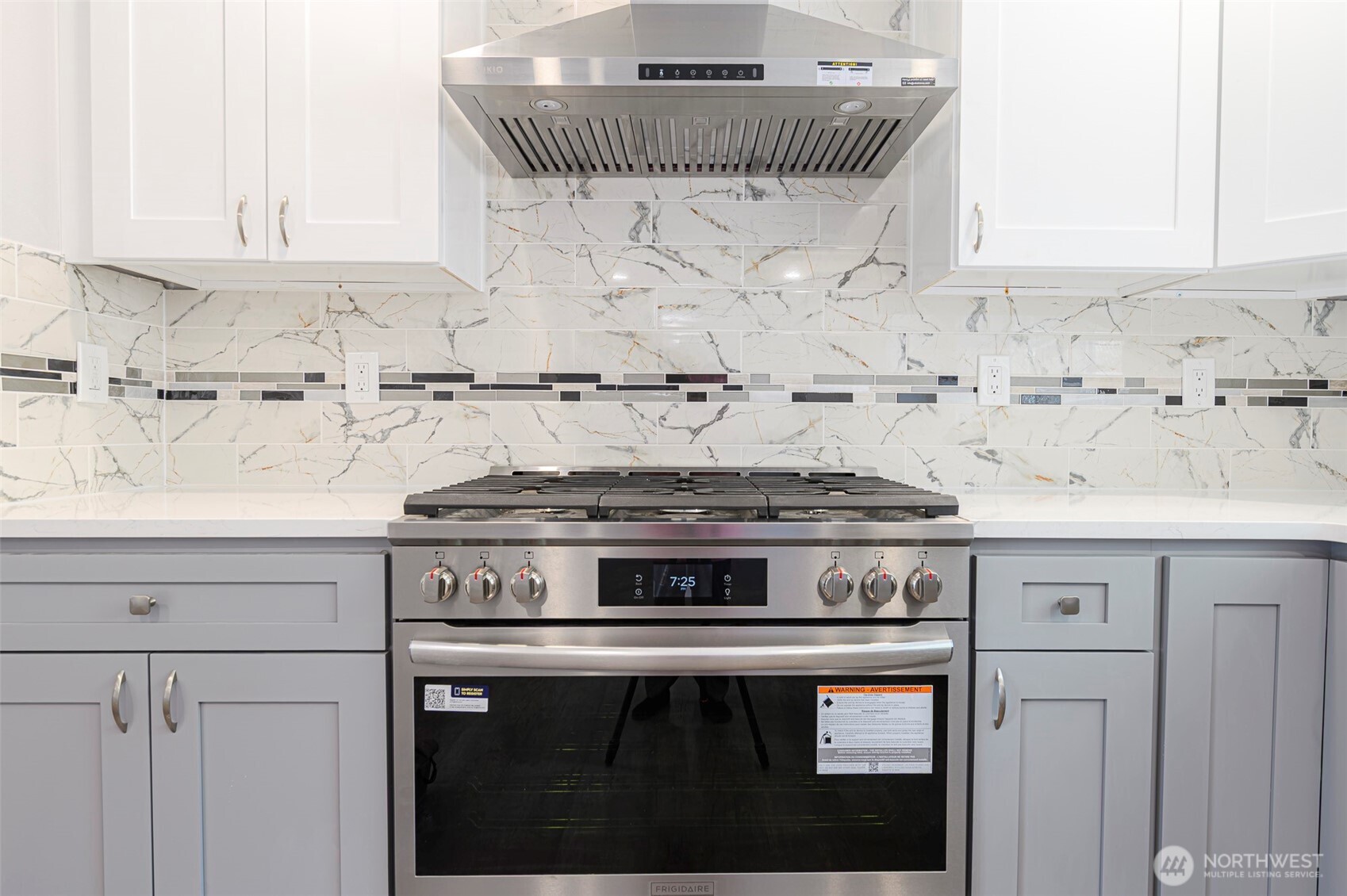 3 Burning Tree Drive, Unit 3 Yakima, WA 98902 - Photo 13 of 32 a stove top oven sitting inside of a kitchen